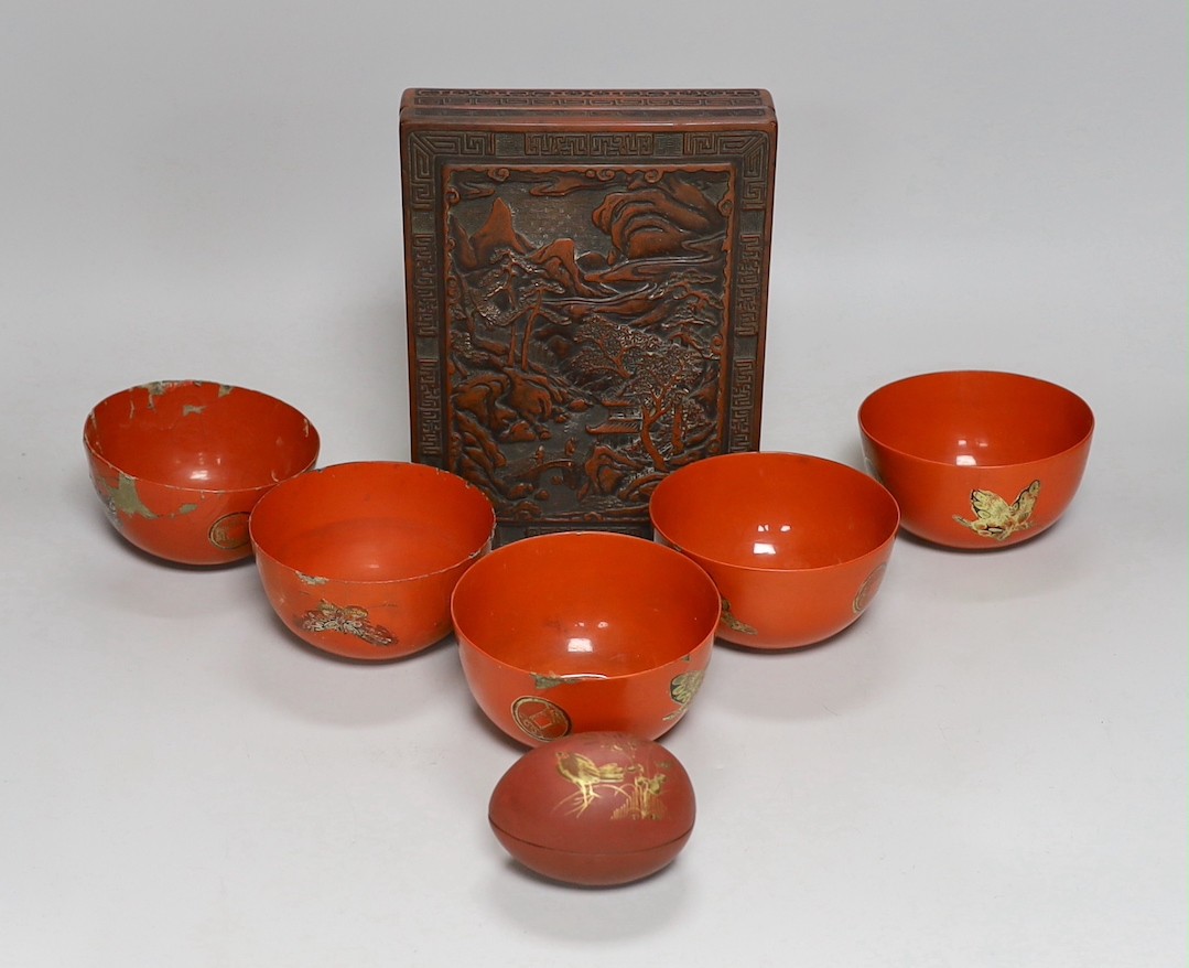 A Chinese rectangular lacquer box, five bowls and an egg shaped box, box 22cms wide x 17cms deep